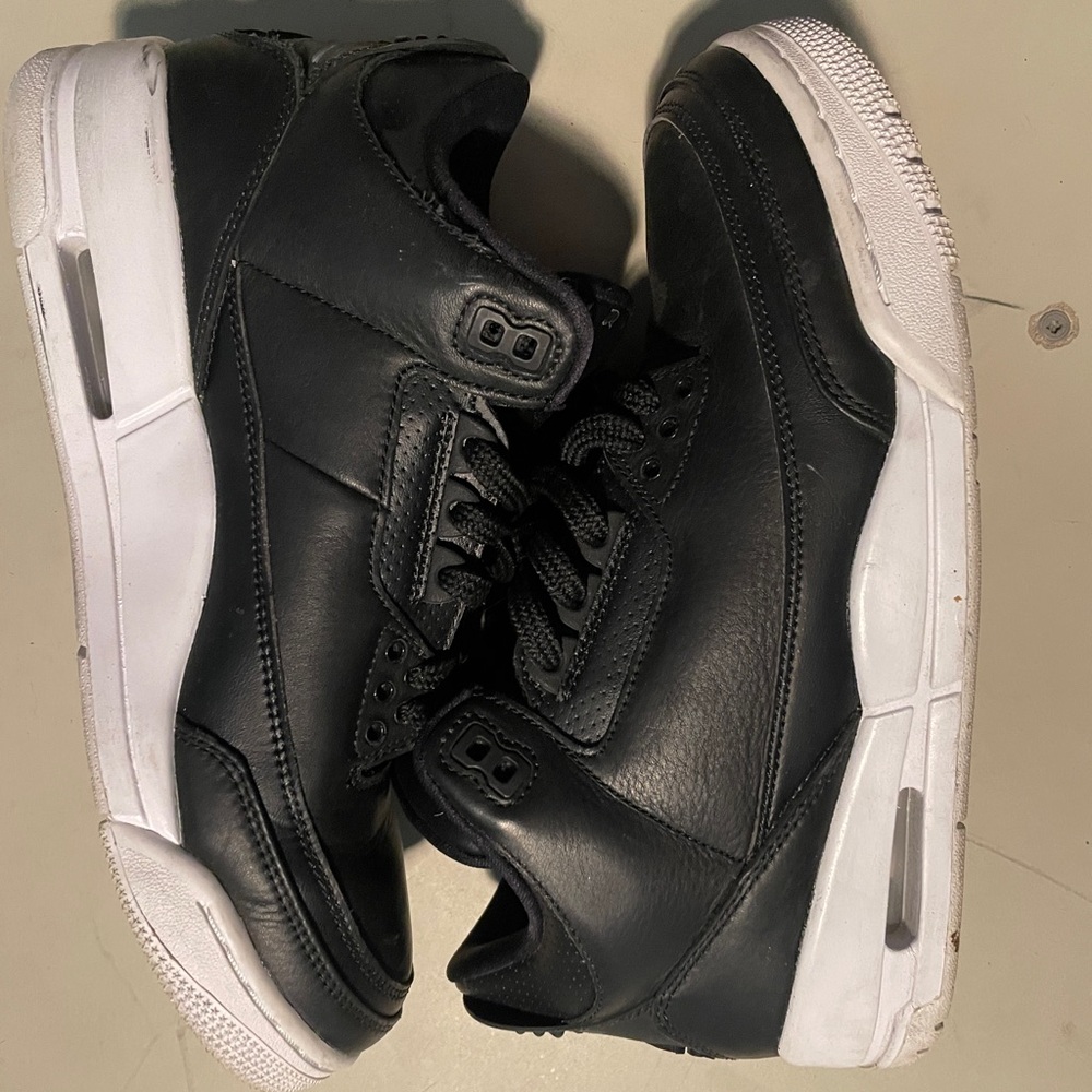 Black leather Jordan Retro 3s